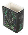 Vase en forme de livre de plantes vénéneuses